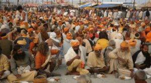 Devotee ending Ekadashi fast with prayer and charity on Dwadashi